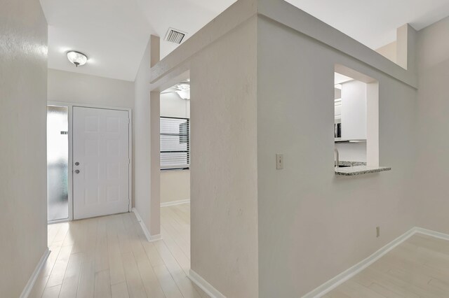 foyer featuring light hardwood / wood-style flooring