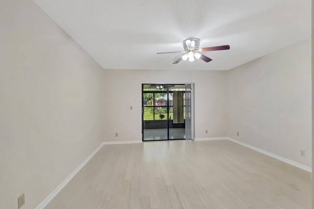 unfurnished room with ceiling fan and light hardwood / wood-style floors