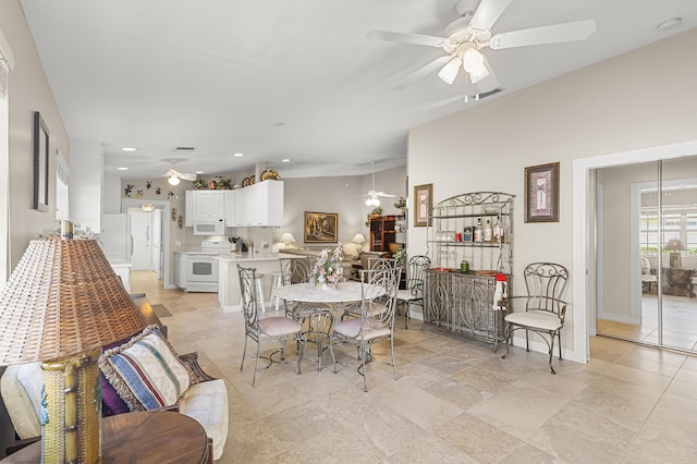 dining space with ceiling fan