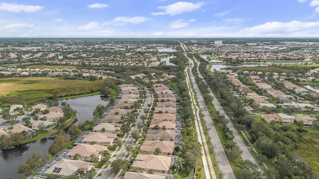 drone / aerial view with a water view