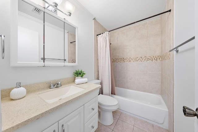 full bathroom featuring tile patterned flooring, vanity, toilet, and shower / bath combo with shower curtain