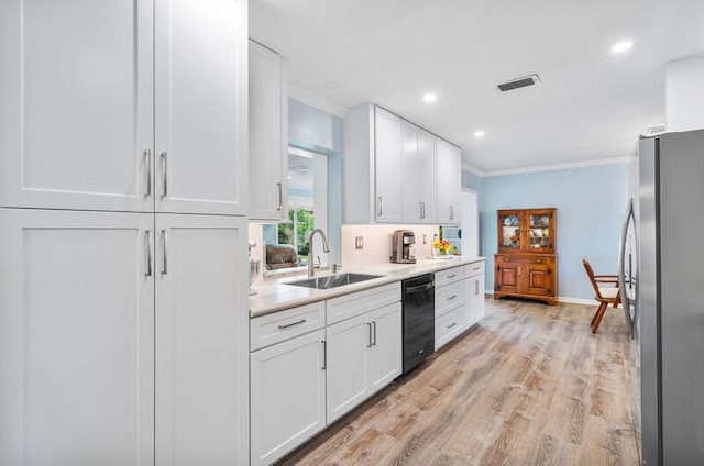 kitchen featuring stainless steel refrigerator, crown molding, dishwasher, and white cabinets