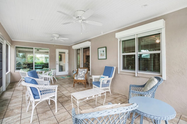 view of patio / terrace featuring ceiling fan