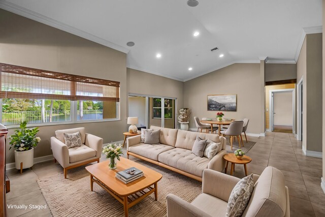 unfurnished room featuring light tile patterned floors, crown molding, and vaulted ceiling