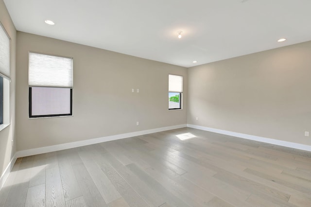 empty room featuring light hardwood / wood-style floors