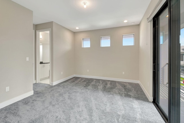 view of carpeted spare room