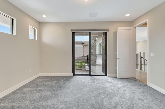 unfurnished room with carpet