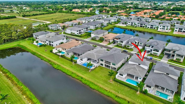 drone / aerial view featuring a water view