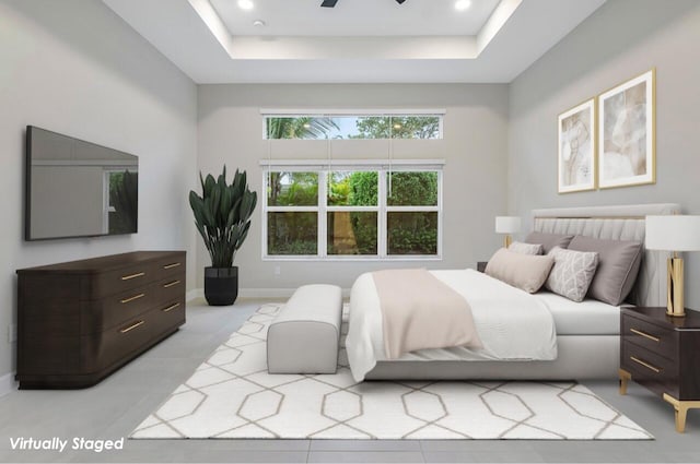 bedroom with a raised ceiling