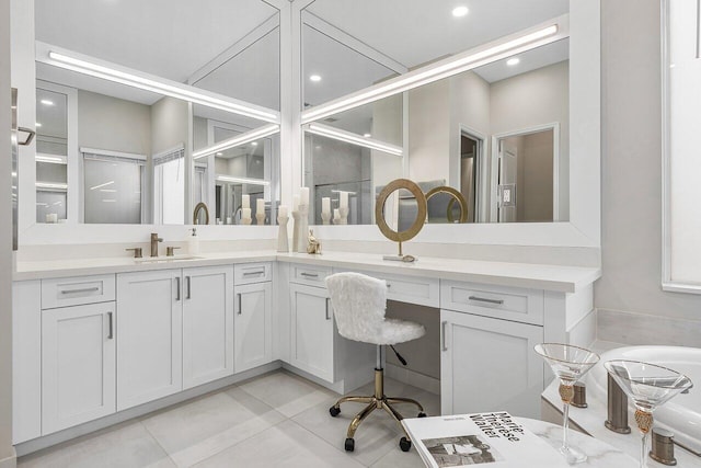 tiled office with sink and built in desk