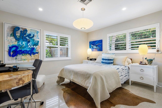 bedroom featuring multiple windows