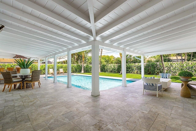 view of swimming pool featuring a patio