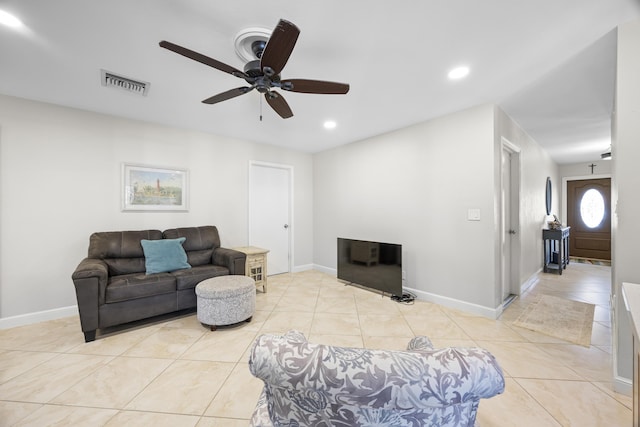 living room featuring visible vents, recessed lighting, tile patterned flooring, baseboards, and ceiling fan