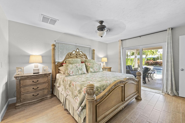 bedroom featuring visible vents, a ceiling fan, light wood finished floors, baseboards, and access to exterior