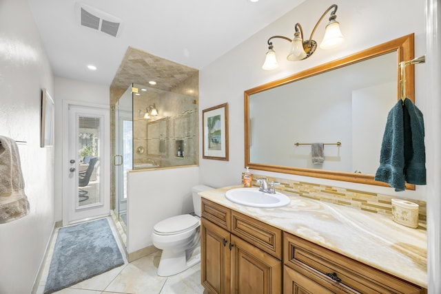 full bath with visible vents, toilet, a stall shower, tasteful backsplash, and vanity