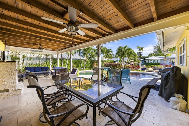 view of patio / terrace with an outdoor pool, outdoor dining area, outdoor lounge area, and a ceiling fan