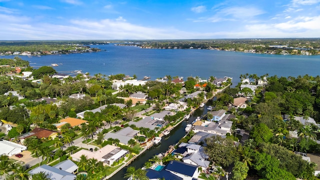 birds eye view of property featuring a residential view and a water view