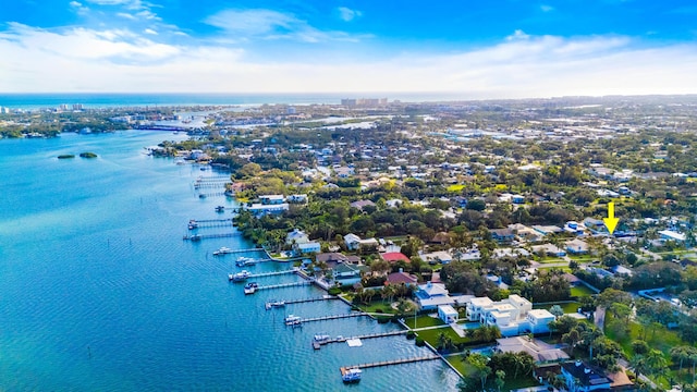 birds eye view of property featuring a water view