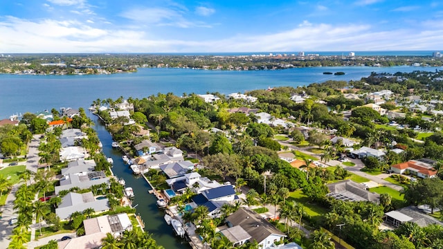 bird's eye view featuring a residential view and a water view