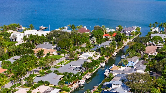 bird's eye view with a residential view and a water view