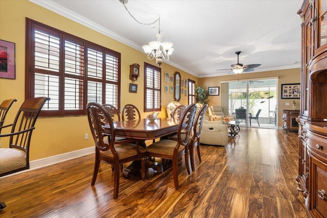 dining area with dark hardwood / wood-style flooring, ceiling fan with notable chandelier, and ornamental molding