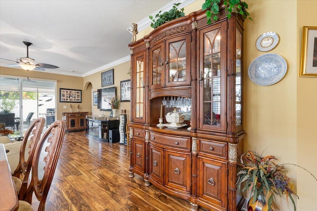 225 SW Coconut Key Way, Port Saint Lucie, FL 34986 - office featuring wood finished floors, crown molding, ceiling fan, and a textured ceiling