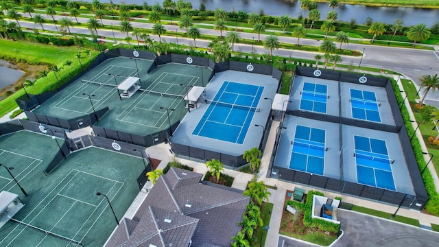 birds eye view of property featuring a water view