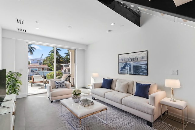 living room featuring concrete floors