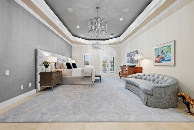 bedroom featuring a tray ceiling, french doors, a chandelier, and ornamental molding