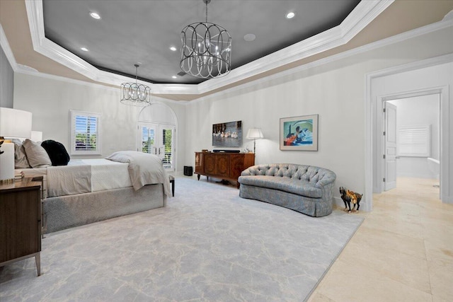 bedroom featuring french doors, connected bathroom, a raised ceiling, and ornamental molding