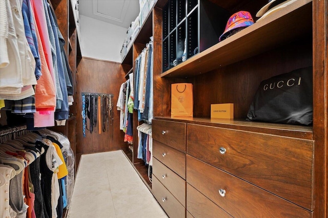 spacious closet with tile patterned flooring