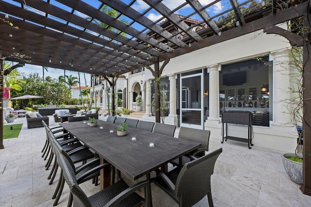 view of patio featuring an outdoor living space and a pergola