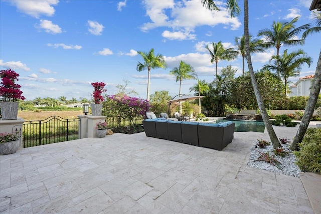 view of patio / terrace featuring a fenced in pool