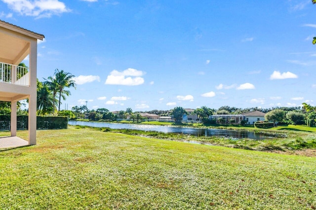 view of yard with a water view