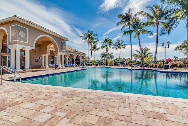 view of swimming pool with a patio