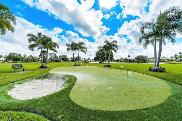 view of home's community with a lawn