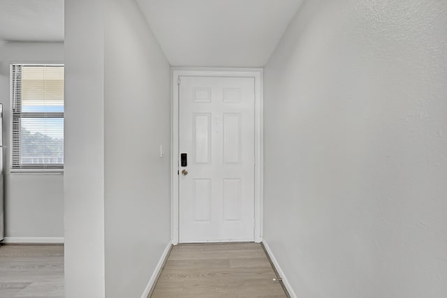 hall featuring light hardwood / wood-style flooring