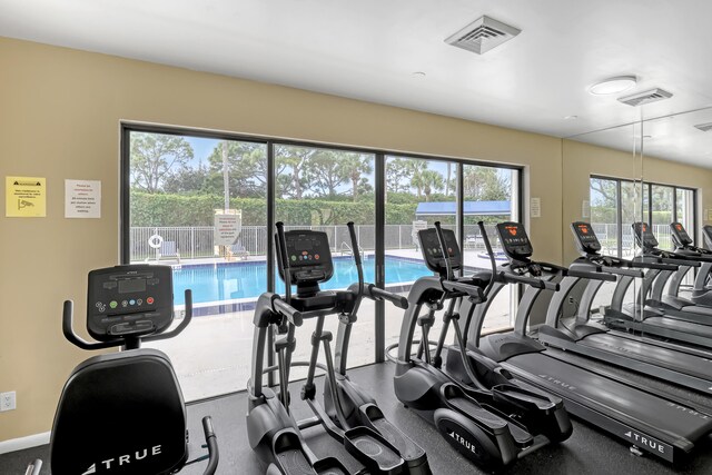 workout area featuring plenty of natural light