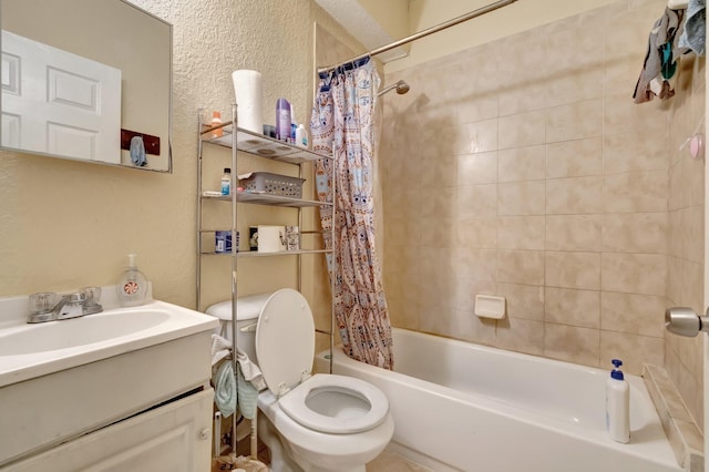 full bathroom featuring shower / tub combo, vanity, and toilet