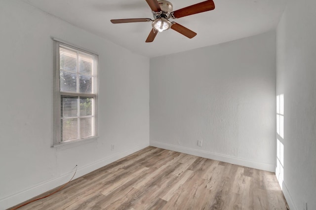 unfurnished room with light hardwood / wood-style floors and ceiling fan