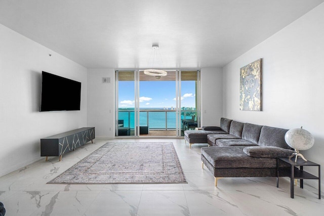 living room with floor to ceiling windows