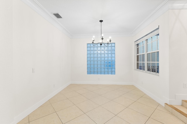 tiled empty room with a notable chandelier and crown molding