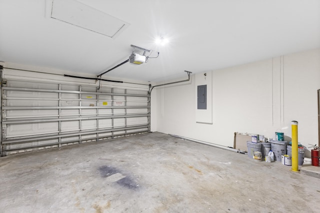 garage with electric panel and a garage door opener