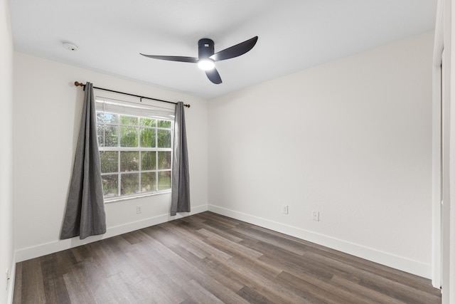 spare room featuring ceiling fan and wood-type flooring