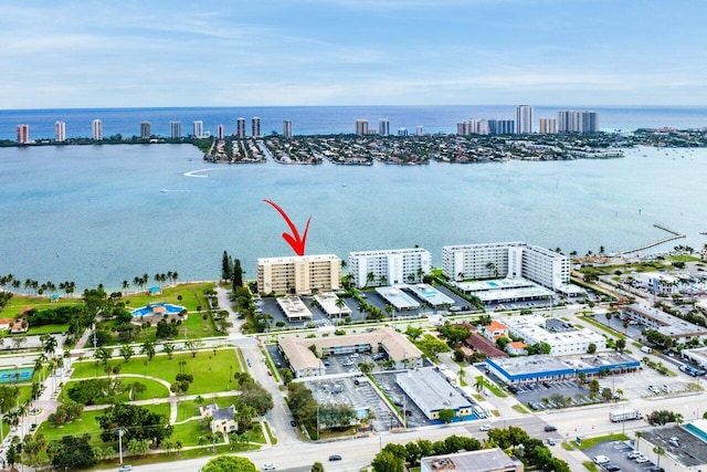 birds eye view of property featuring a water view