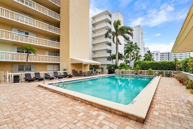 view of pool with a patio area