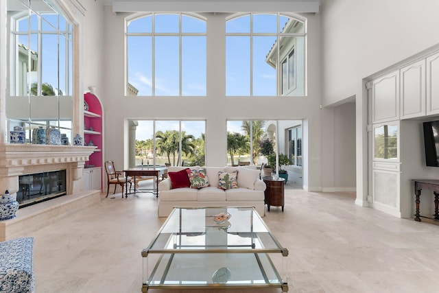 living room featuring a high ceiling