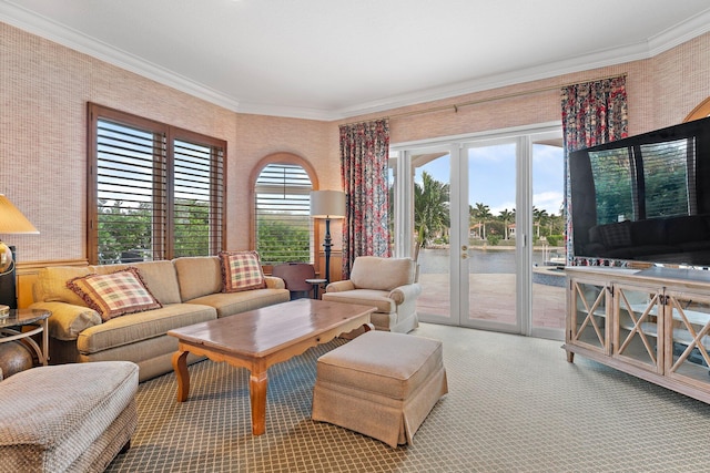 living room featuring carpet, crown molding, and french doors