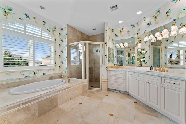 bathroom featuring vanity, independent shower and bath, plenty of natural light, and ornamental molding