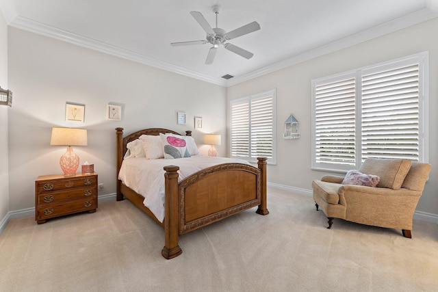 bedroom with light carpet, ceiling fan, and ornamental molding